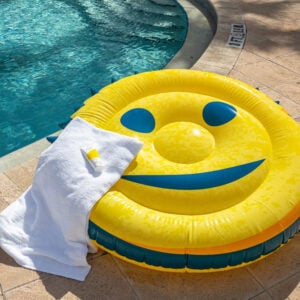 Scrub Daddy Pool Float next to a pool