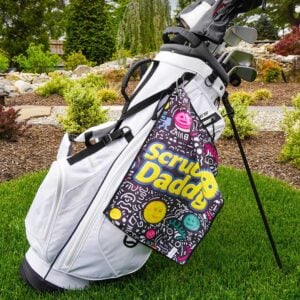 Scrub Daddy Limited Edition Sports Towel hanging off of a golf bag