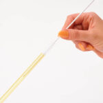 Pulling Straw Cleaner out of tube